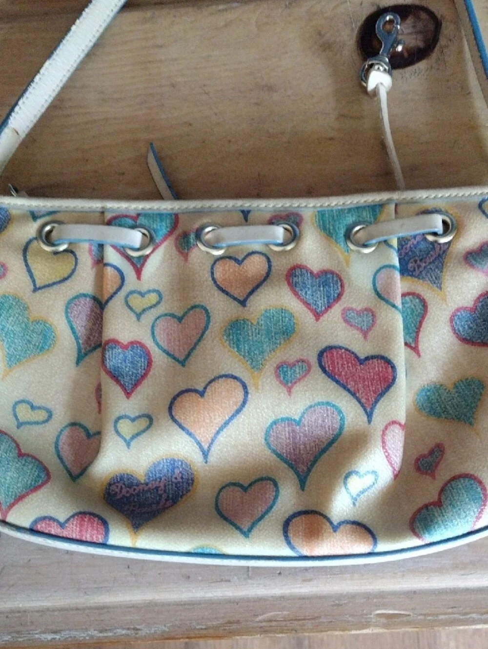 Dooney & Bourke Cream Shoulder Bag with Multicolor Heart Print
